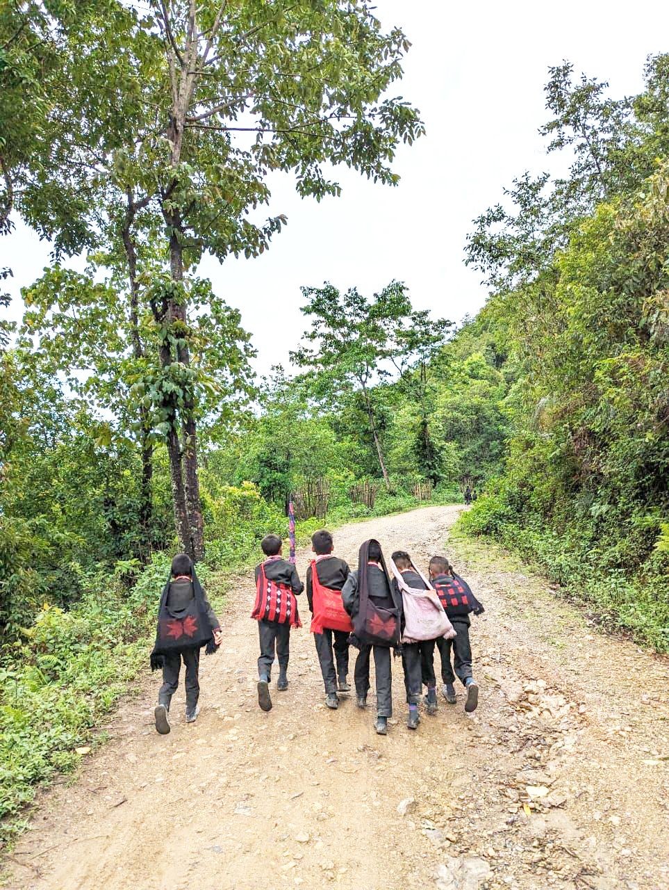 School bags on heads, laughter in the air, school days are the best for these boys at ITC Dan at Indo-Myanmar border under Noklak district. They walk 10 kilometres to school every day without a fuss. (Morung Photo)